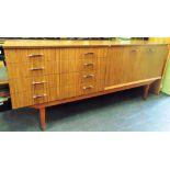 A 'RETRO' DESIGN FORMICA DINING ROOM SUITE comprising sideboard 182cm long, drop-leaf dining table