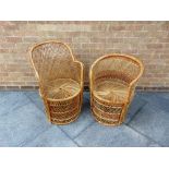 TWO 1970S WICKER PEACOCK CHAIRS the tallest 91cm high