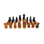 A ST. GEORGE PATTERN BOXWOOD & EBONY CHESS SET unsigned, the kings 80mm high, contained in a printed