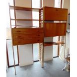 FOUR BAYS OF STAPLES 'LADDERAX' WALL FURNITURE comprising three-drawer chest, sliding door