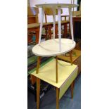 A FORMICA DROP-LEAF KITCHEN TABLE an oval Formica top coffee table, and another Formica table
