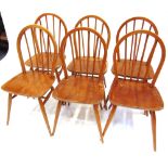 A SET OF SIX ERCOL STICKBACK WINDSOR DINING CHAIRS on H-shape stretcher bases