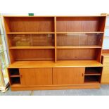 A LARGE SCANDINAVIAN TEAK WALL UNIT the upper section with shelves and sliding glass doors, the base