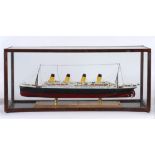A MODEL OF THE WHITE STAR PASSENGER LINER 'R.M.S. TITANIC' of plastic construction, set to a