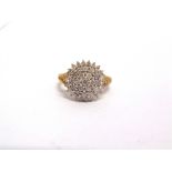 A 9 CARAT GOLD FORTY ONE STONE DIAMOND CLUSTER RING the brilliant cuts totalling approximately 1.1