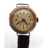 A LADY'S SILVER WRIST WATCH Edinburgh import marks 1923, the embossed dial with black Arabic