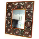 A DANISH WALL MIRROR with teak and tile frame, 50cm wide 60cm high