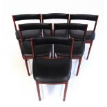 A SET OF SIX MACINTOSH ROSEWOOD DINING CHAIRS with black vinyl seats and backrests