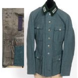 DAS DEUTSCHE HEER - FIELD SERVICE TUNIC of four-pocket green wool/rayon construction with a dark