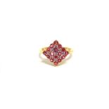 A PINK SPINEL 9 CARAT GOLD CLUSTER RING the square head with nine diamond points, finger size M,