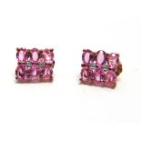 A PAIR OF KUNZITE CLUSTER EARSTUDS of rectangular shape, stamped '9K', 1.6g gross