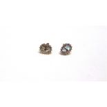 A PAIR OF 9 CARAT GOLD AQUAMARINE AND DIAMOND EARSTUDS 1.6g gross