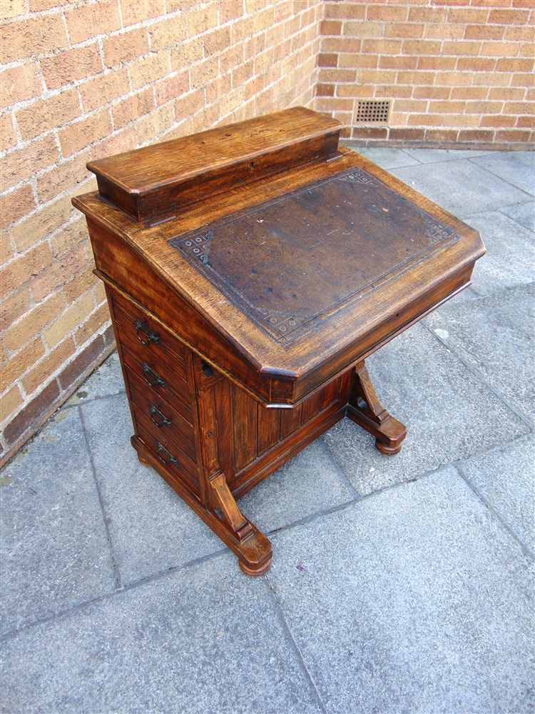 A LATE VICTORIAN OAK DAVENPORT DESK with leather inset top opening to fitted interior, four - Image 2 of 2