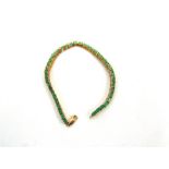 A 9 CARAT GOLD EMERALD LINE BRACELET 18.4cm long, 9.9g gross