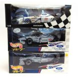 THREE 1/18 SCALE STEWART FORMULA 1 RACING CARS comprising a Minichamps Stewart Ford SF1 (R.