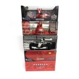 FOUR 1/18 SCALE FERRARI FORMULA 1 RACING CARS comprising a Hot Wheels Ferrari F2001 (M. Schumacher);