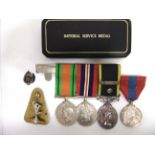 A SECOND WORLD WAR & LATER GROUP OF FOUR MEDALS TO CORPORAL D.J. COMINS, ROYAL SIGNALS comprising