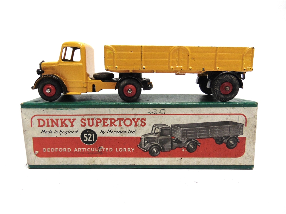 A DINKY NO.521, BEDFORD ARTICULATED LORRY yellow with black wheel arches and red ridged hubs, good