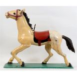 [FAIRGROUND ART]. A CARVED WOODEN ROUNDABOUT HORSE BY MATTHIEU circa 1940, in original showpaint, on