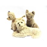 THREE SOFT TOYS comprising a blonde mohair musical poodle soft toy, with clear glass eyes and a