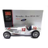 A 1/18 SCALE CMC NO.M052, MERCEDES-BENZ W125, 1937 silver, mint or near mint, boxed.