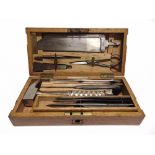 A FIELD SURGEON'S POST-MORTEM SET BY MAYER & MELTZER, LONDON in a fitted oak box, 5cm high, 24.5cm