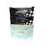 THREE 1/18 SCALE MCLAREN FORMULA 1 RACING CARS comprising a Hot Wheels McLaren Mercedes MP4-20 (K.