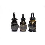 THREE RAILWAY HAND LAMPS comprising a London, Midland & Scottish Railway three aspect hand lamp,