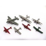 SEVEN ASSORTED DINKY DIECAST MODEL AIRCRAFT comprising a Light Racer, red; Flying Boat, silver;