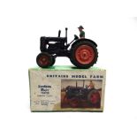 A BRITAINS NO.128F, FORDSON MAJOR TRACTOR WITH RUBBER TYRES dark blue with orange wheels, complete