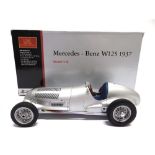 A 1/18 SCALE CMC NO.M031, MERCEDES-BENZ W125, 1937 silver, mint or near mint, boxed.