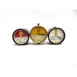 THREE SIGNAL REPEATERS one with a brass case and two with bakelite cases, each approximately 10cm