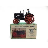 A BRITAINS NO.127F, FORDSON MAJOR TRACTOR WITH SPUDDED METAL WHEELS dark blue with orange wheels,
