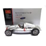 A 1/18 SCALE CMC NO.M043, AUTO-UNION TYP D, 1938-1939 silver, mint or near mint, boxed.