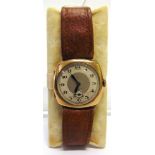 ANONYMOUS, A 9 CARAT GOLD GENTLEMANS WRIST WATCH London 1936, the two piece hinged case housing an