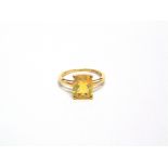 A 9 CARAT GOLD SINGLE STONE FACETTED OPAL RING finger size O, 2g gross