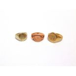 A COLLECTION OF THREE 9 CARAT GOLD SIGNET RINGS 21.5g gross