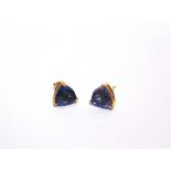 A PAIR OF COLOUR CHANGE FLUORIE EARSTUDS stamped '10k'