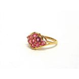 A 9 CARAT GOLD PINK SPINEL CLUSTER RING finger size O, 2g gross