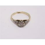 A DIAMOND SINGLE STONE RING stamped '18ct', the illusion set brilliant cut of approximately 0.2