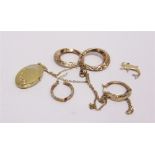 A PAIR OF 9 CARAT GOLD HOOP EARRINGS a two colour pair of hoop earrings, stamped '9K'; a locket,