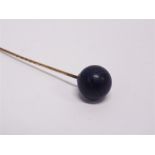 A LAPIS LAZULI STICKPIN the bead of approximately 1.4cm