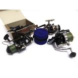 A GROUP OF FOUR FISHING REELS including Shimano 'GT 8000', 'Aero 4500', Amplifier '705' and a