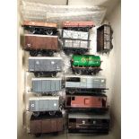 [OO GAUGE]. FOURTEEN ASSORTED WAGONS including three brake vans, all unboxed.