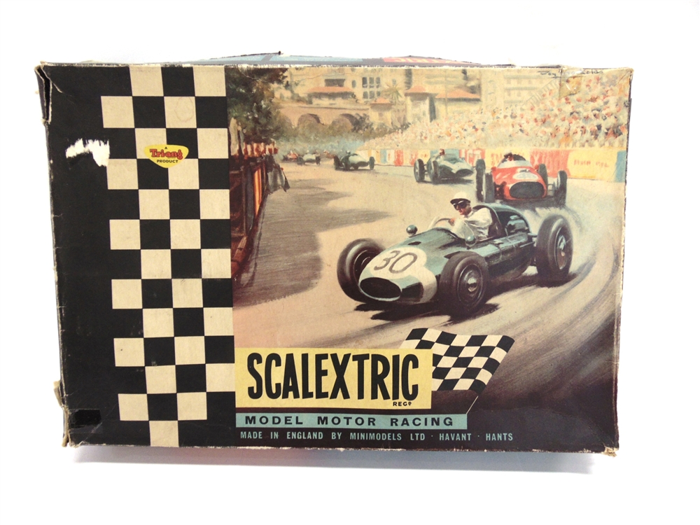 A SCALEXTRIC SET '50' comprising a C73, Porsche F1, red; C72, B.R.M., blue; controllers; and