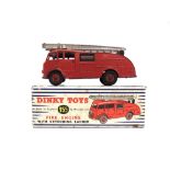 A DINKY NO.955, FIRE ENGINE red with a silver ladder and red grooved hubs, unglazed, generally