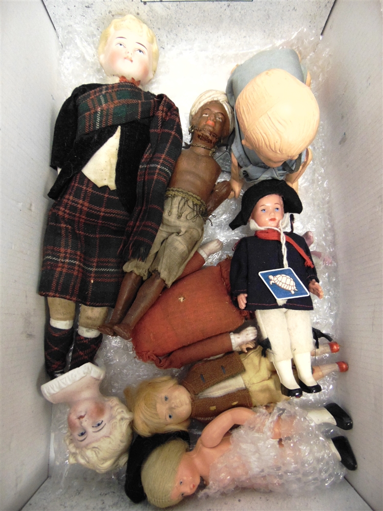 ASSORTED BISQUE, COMPOSITION & PLASTIC DOLLS comprising a Tri-ang plastic crawling baby, with a