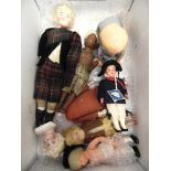 ASSORTED BISQUE, COMPOSITION & PLASTIC DOLLS comprising a Tri-ang plastic crawling baby, with a