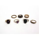 A COLLECTION OF FIVE 9 CARAT GOLD RINGS 10.4g gross, one silver ring; and a costume jewellery ring