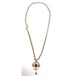 AN EDWARDIAN GARNET AND SEED PEARL PENDANT tagged '9ct', on a chain of round facetted belcher links,